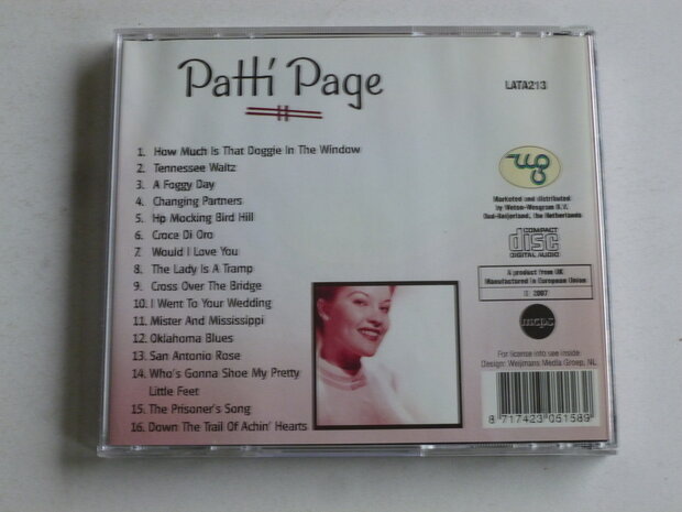 Patti Page - How much is that doggie in the window